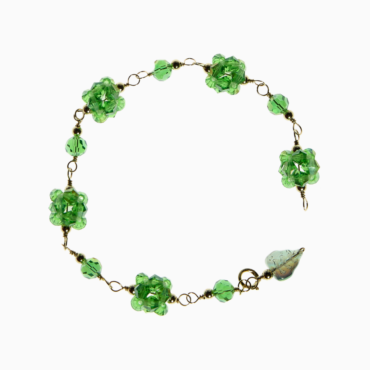 August Peridot Green Bracelet featuring a bold peridot-inspired crystal, hand-sewn with 4mm bicone crystals to create a larger statement piece, along with sparkling 6mm bicone glass crystals and a cute leaf charm.