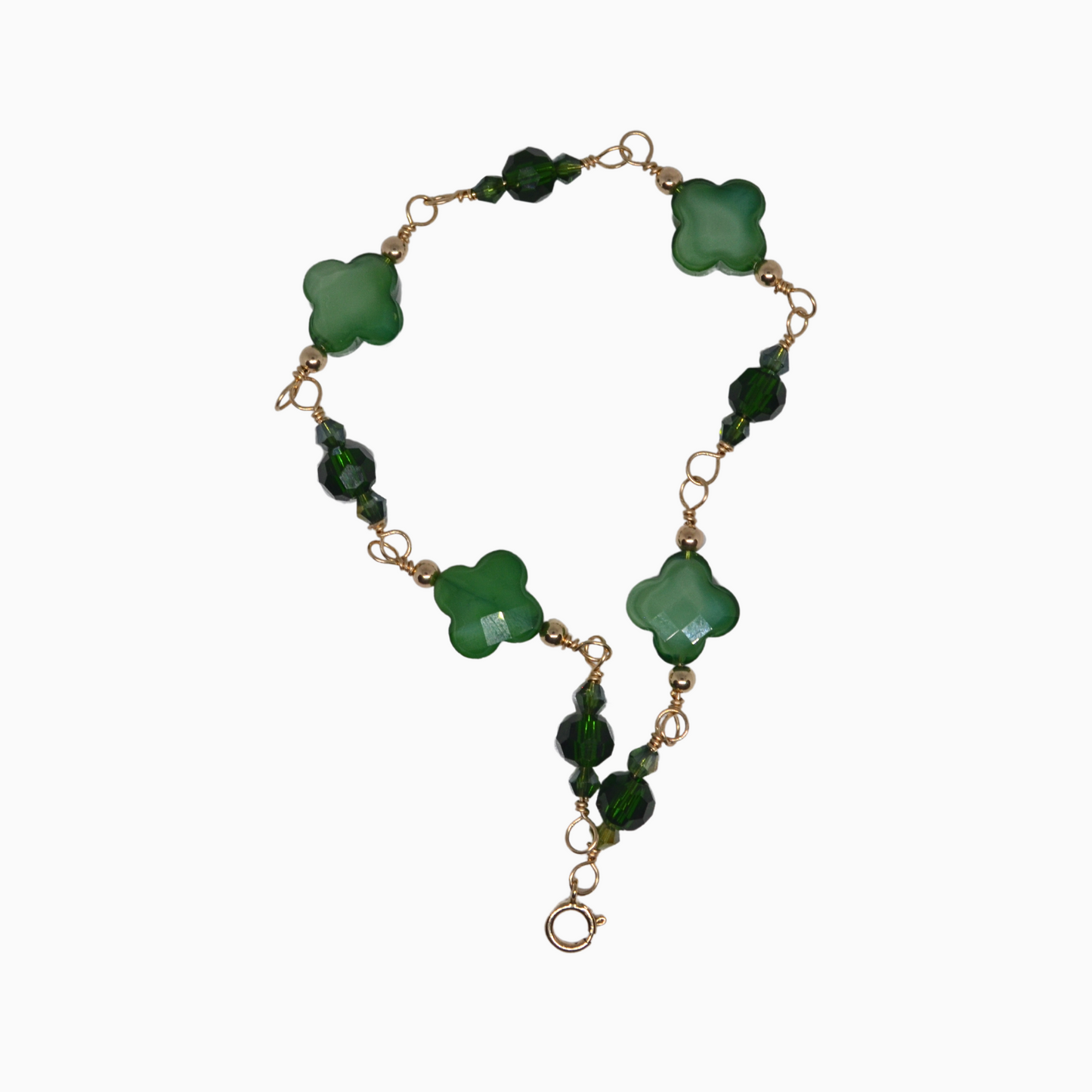 This stunning, handmade bracelet features emerald inspired green crystal clovers, symbolizing luck and prosperity. Crafted with 14k gold-filled wire, this elegant piece is perfect gift for any occasion.