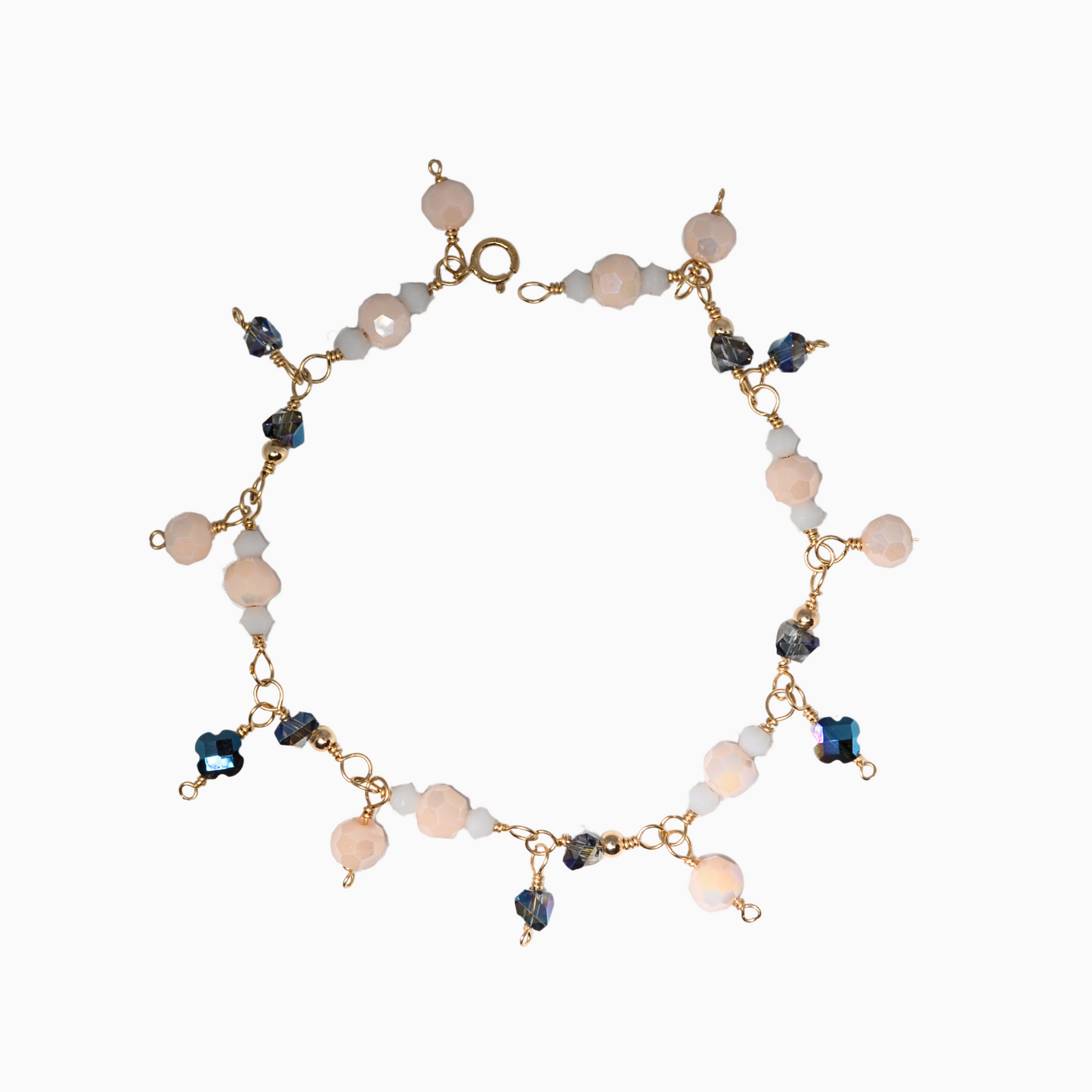 This stunning, handmade June birthstone bracelet features a captivating blend of pearl, moonstone, and alexandrite-inspired crystals. Crafted with 14k gold-filled wire, this elegant piece is perfect for any occasion.