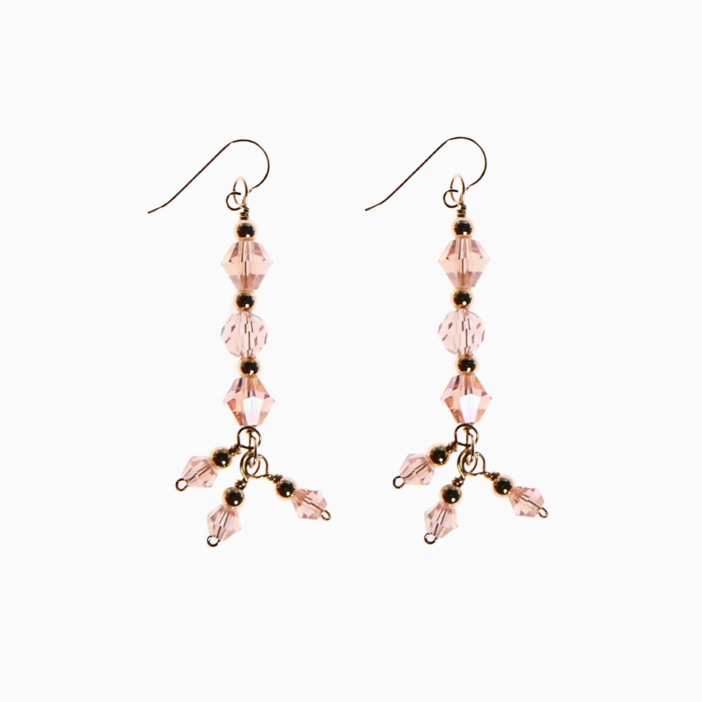 Pink tourmaline October dangling earring handcrafted with luxe 14k gold-filled materials, these dreamy earrings feature shimmering 6mm bicone and round glass crystals, with 4mm bicone crystals and delicate gold-filled spacer balls for a chic, elegant touch