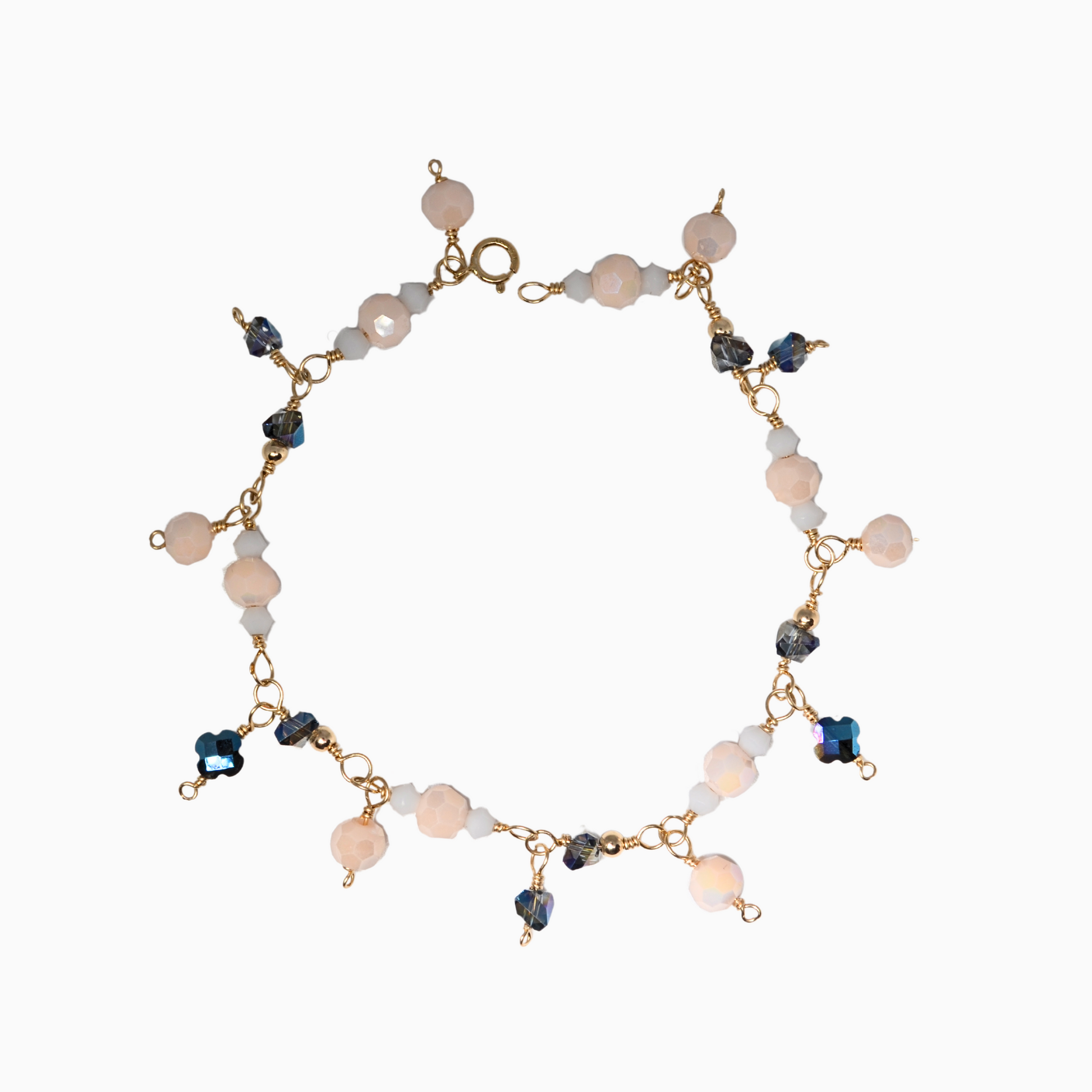 This stunning, handmade June birthstone bracelet features a captivating blend of pearl, moonstone, and alexandrite-inspired crystals. Crafted with 14k gold-filled wire, this elegant piece is perfect for any occasion. 