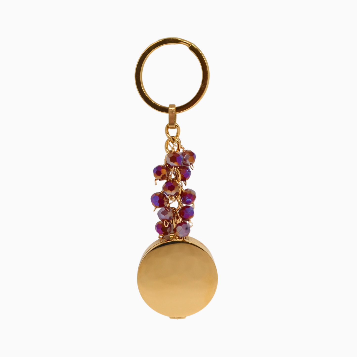 Stylish Garnet Pocket Locket Keychain made of gold stainless steel, featuring a rich red glass crystal that symbolises passion and protection. Includes a built-in mirror and compartment for storing small essentials like lip balm or keepsakes. A perfect accessory for January birthdays or those who love bold, vibrant colours.