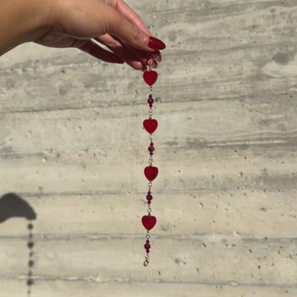 This video shows how the red heart, bicone and round crystal shines when the sun hits.